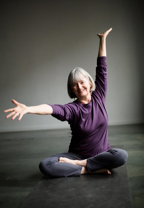 Marcia Miller, E-RYT 500, IAYT registered yoga therapist, certified iRest teacher, has been teaching yoga for over 45 years and has taught all levels and types of students from new beginners to yoga teachers and everyone in between. In 2001 Marcia was one of the founders/owners of Yoga on High and remained an owner of the large Midwestern yoga studio until 2021. Along with her two business partners she wrote the curriculum for and co-directed the 200- and the 500-hour Teacher Training Programs and taught dozens of silent retreats. Yoga on High was also the Midwest hub for UZIT trainings, and Marcia led yearly trainings in this potent program of selfcare and caring for others.
She designed and taught the yoga protocol for two large Ohio State University research projects, one researching the effect of yoga on the immune system and the other on the benefits of yoga for women recovering from breast cancer that was the largest study of its kind at the time.. 
Marcia is also a Reiki Master Teacher and is the Reiki Master for the UZIT training with students all over the country. In addition to teaching all levels of Reiki students, she and another colleague have designed a special Reiki training that includes skillful, non-judgmental questioning, called Dancing with Dragons. She is also passionate about Nonviolent Communication (NVC) and weaves it into everything she does. In 2008, Marcia took the lead in founding the Karma Yoga Foundation, a fund at the Columbus Foundation, as a way to serve all populations of people in her community including low-income kids, homeless veterans, and people in prison. Having experienced much death in her life she is one of the Death Mavens in Columbus Ohio, creating places and opportunities for people to talk about death and grief.
A lifelong learner, a mother and wife, Marcia lives on a farm and is planting as many native trees and plants as she can to support the diversity of life here on earth. You can find her at www.Marciamilleryoga.com